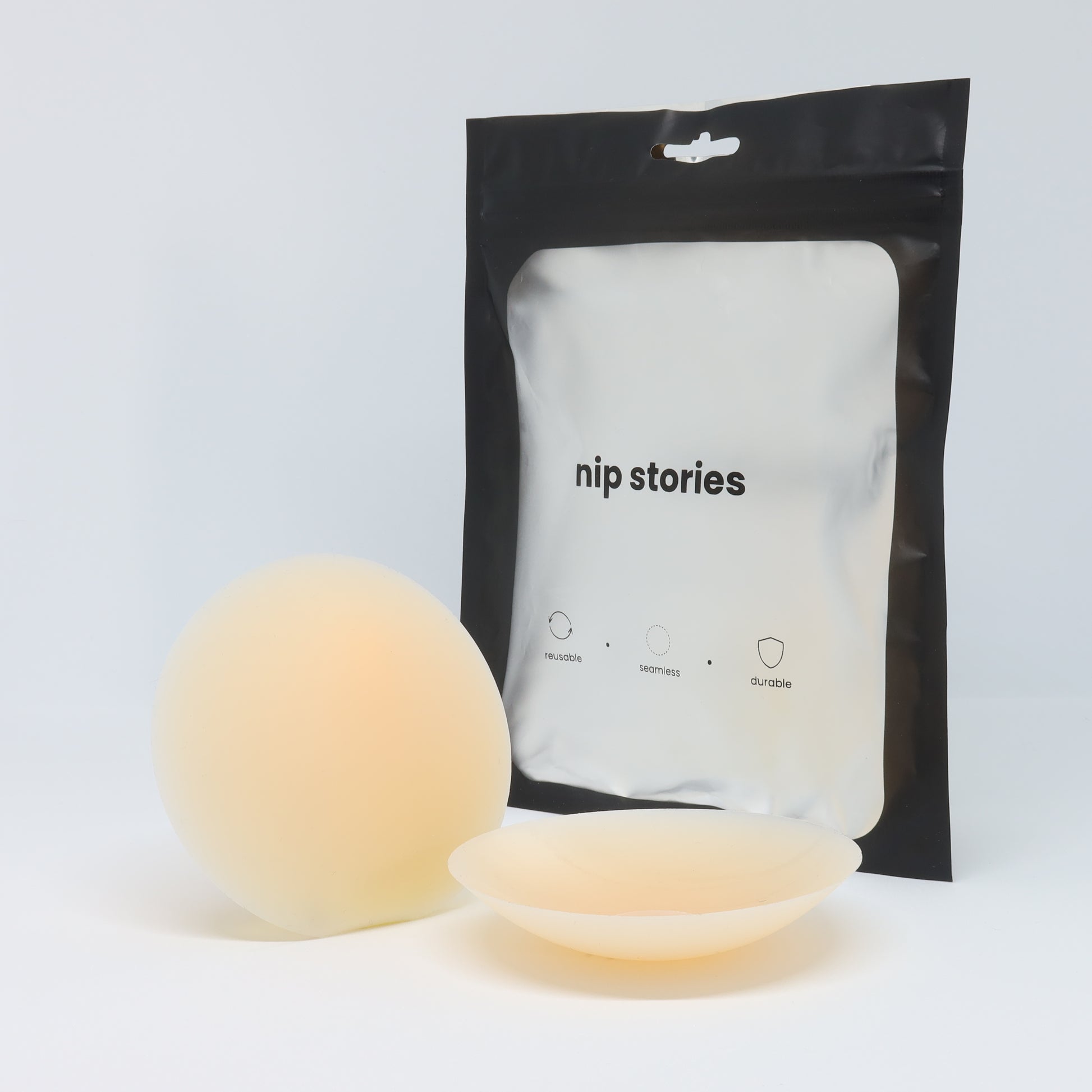 front view of nip stories 8 cm light adhesive nipple covers in nz