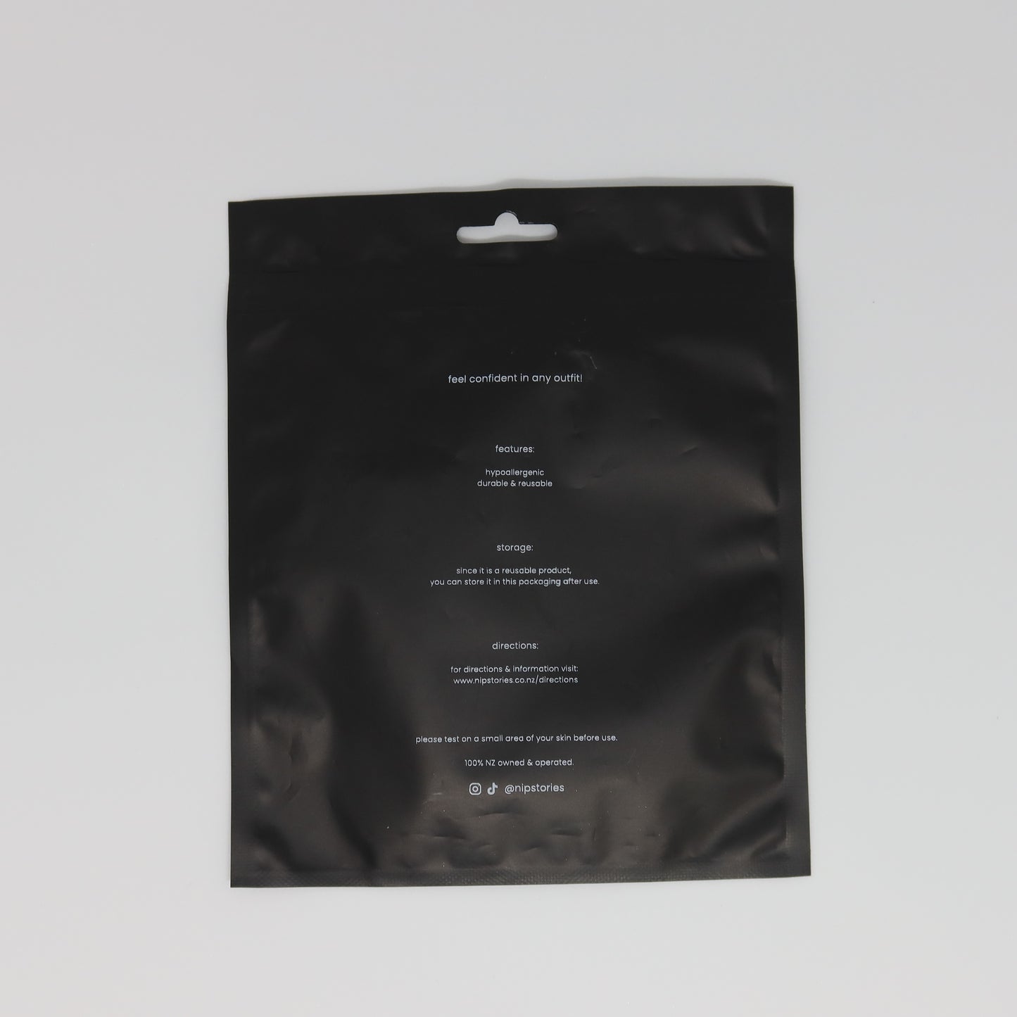 back view of nip stories packaging nz