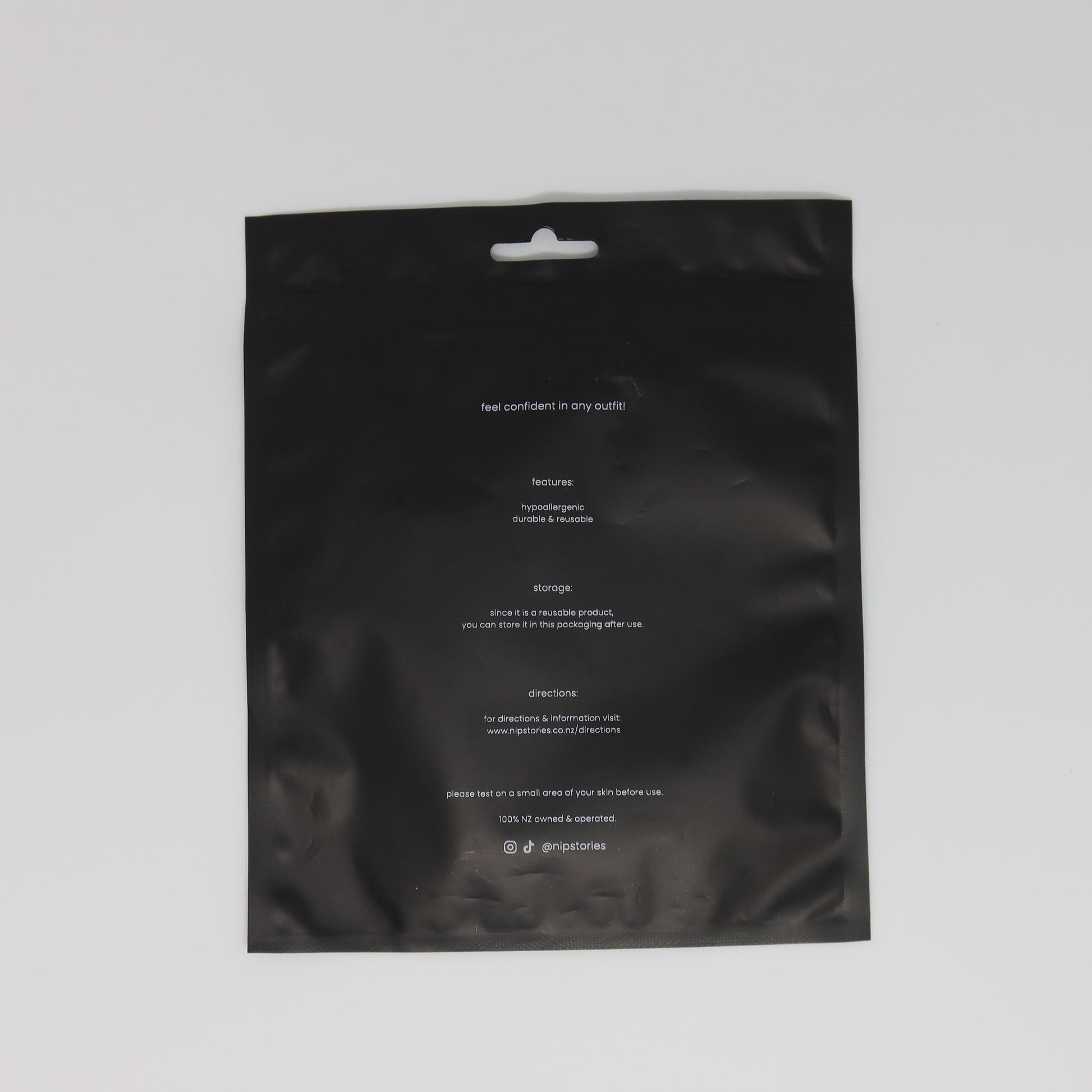 back view of nip stories packaging nz