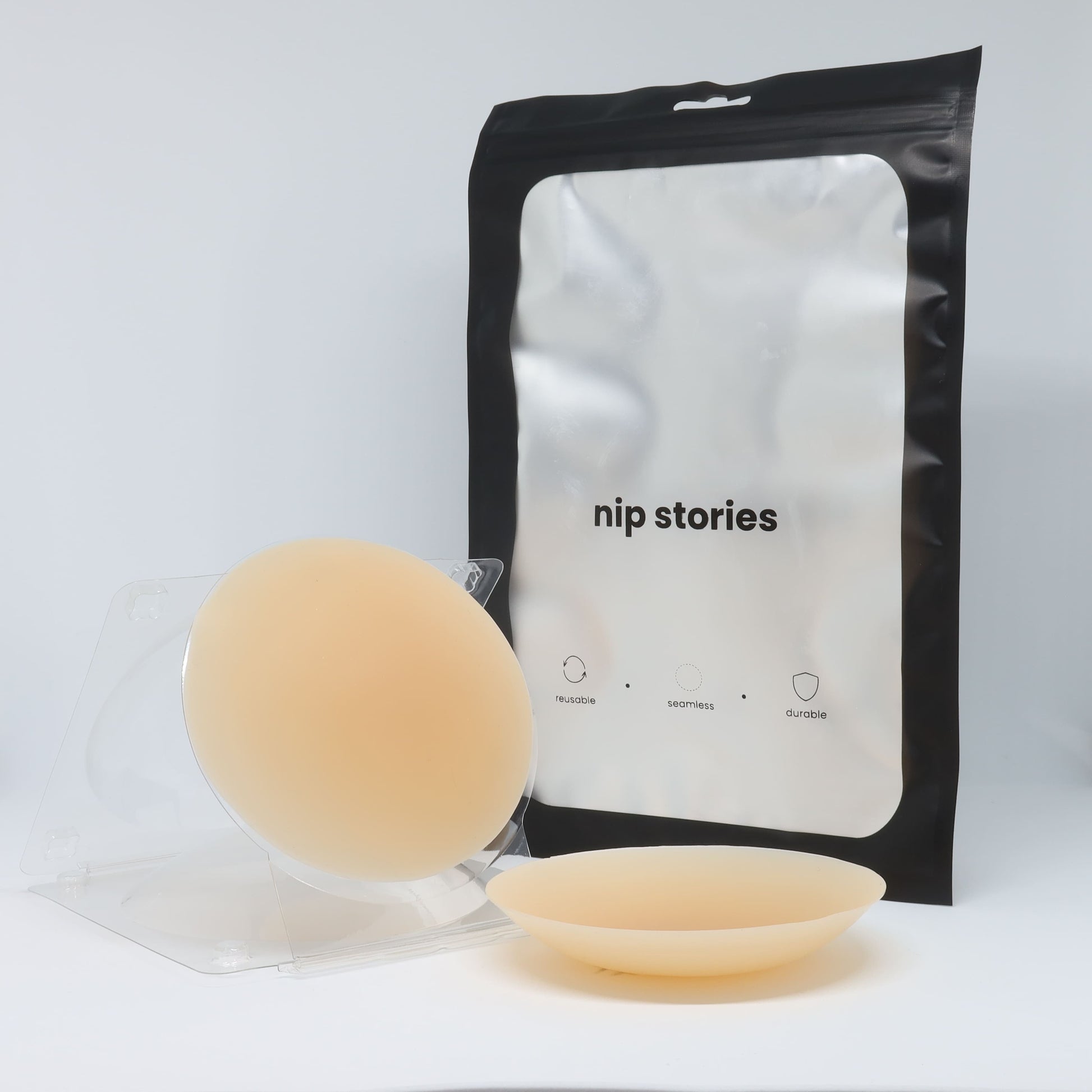 front view of nip stories 10 cm nude non adhesive nipple covers in nz