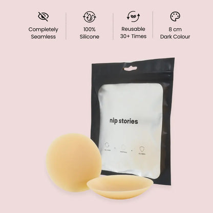 nip stories 8 cm Dark colour adhesive nipple covers with packaging on a pink background