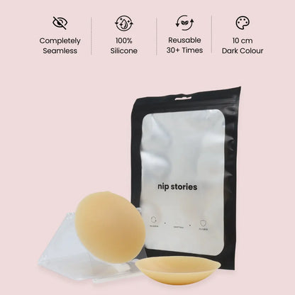nip stories 10 cm Dark colour non-adhesive nipple covers with packaging on a pink background