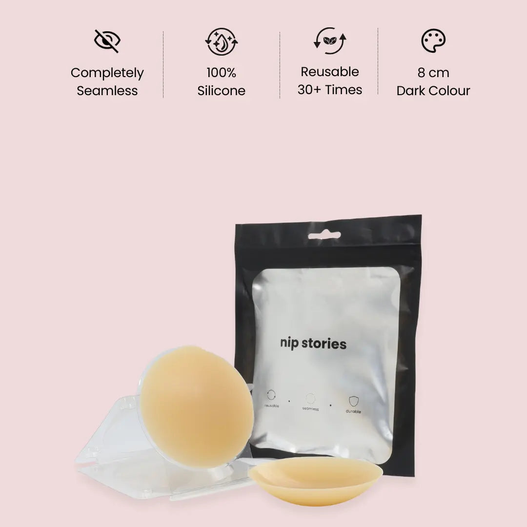 nip stories 8 cm Dark colour non-adhesive nipple covers with packaging on a pink background