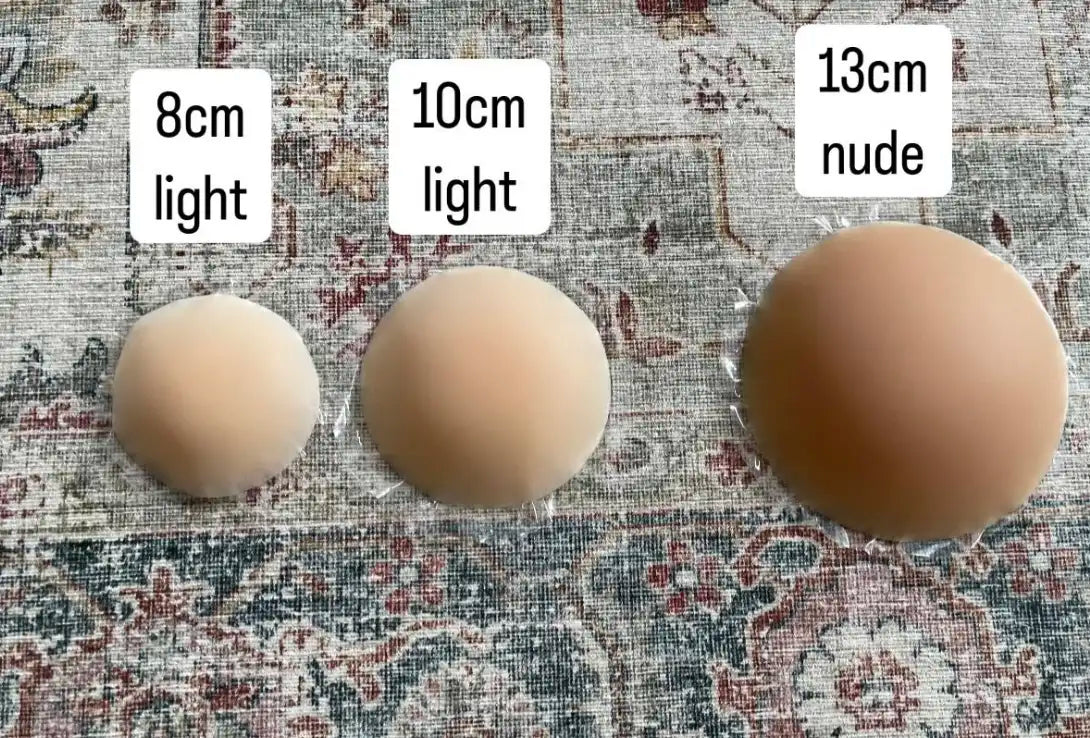 nip stories nipple covers size comparison photo showing 8 cm, 10 cm and 13 cm nipple covers on a carpet background