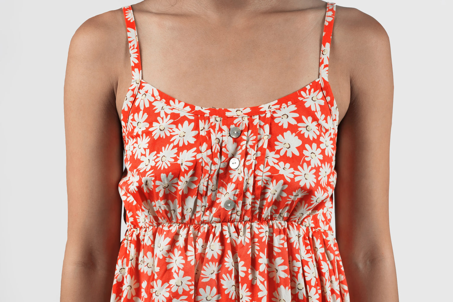 woman wearing summer dress with nipple covers